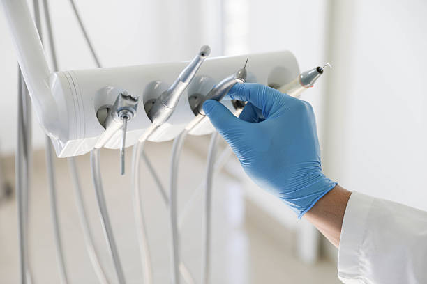Professional Invisalign Clear Aligners technician working in Adrian, MO